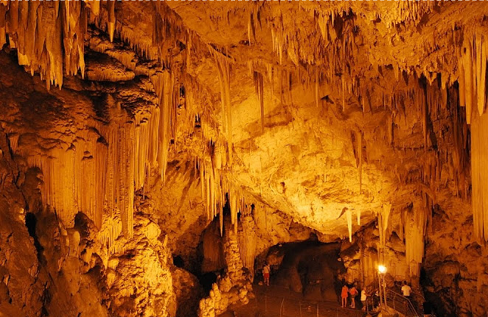 large chamber of Antiparos cave with stalactites and stalagmites